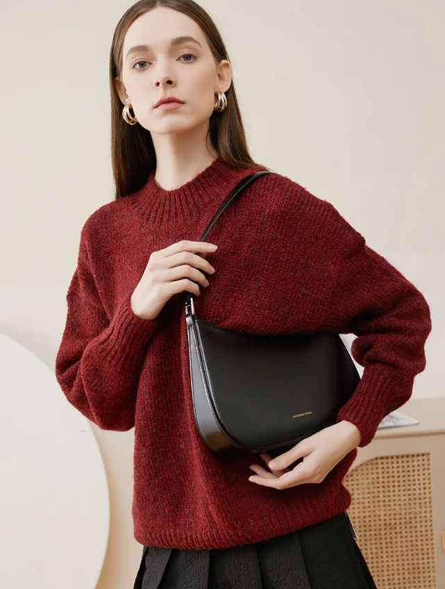 model with handbag